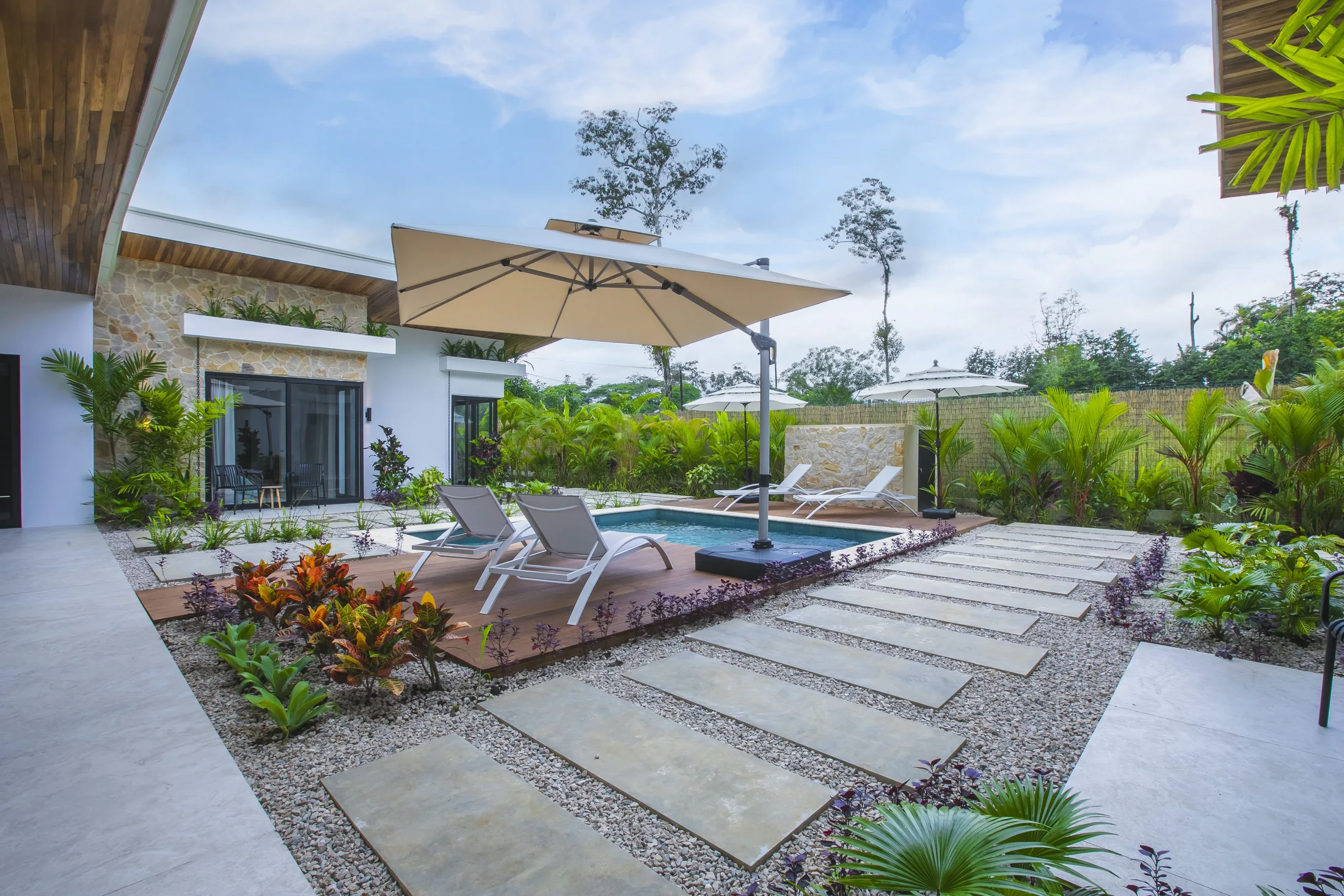 Covered patio and outdoor living area at Villa Amara
