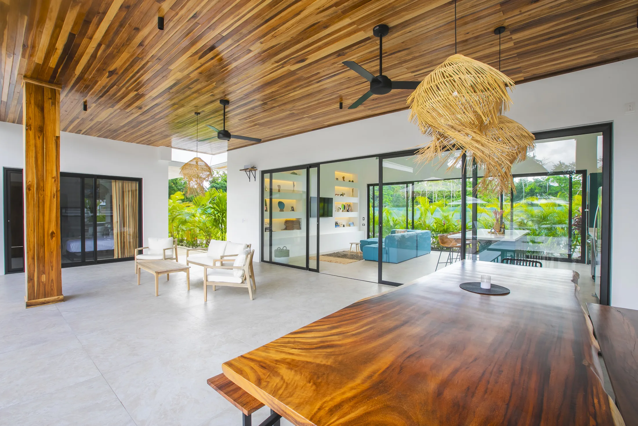 Indoor-outdoor lounge opening to the terrace